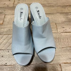 Powder blue crocodile leather platforms